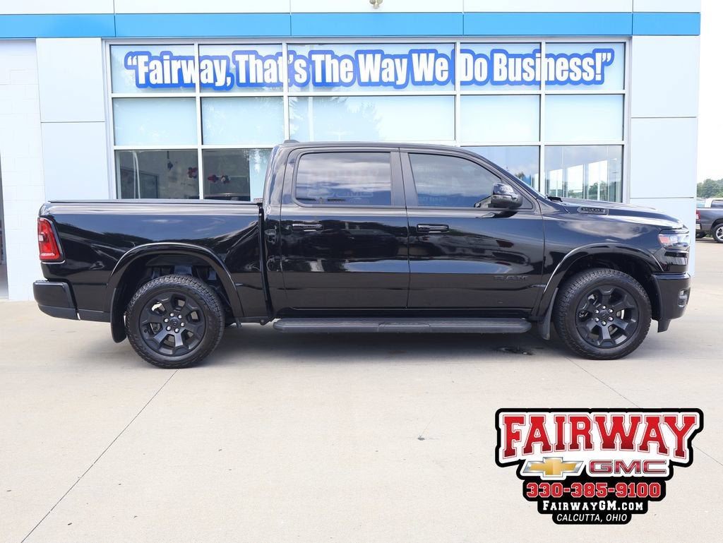 2025 RAM 1500 Big Horn Crew Cab 4x4 5'7" Box in Black — front three-quarter view