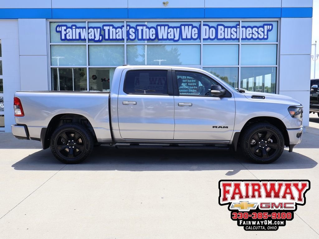 2021 RAM 1500 Big Horn Crew Cab 4x4 5'7" Box in Silver — front three-quarter view