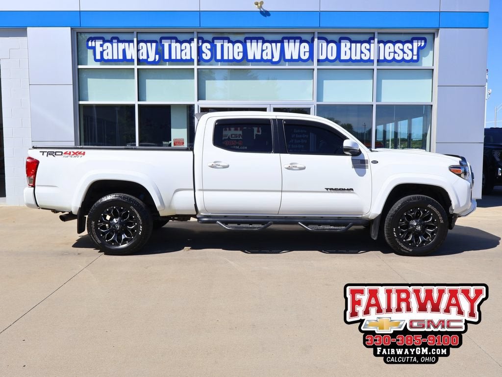 2016 Toyota Tacoma SR5 in White — front three-quarter view